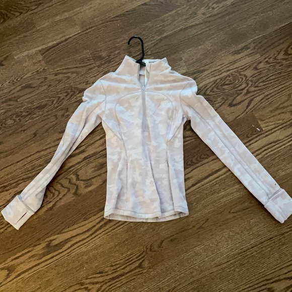 blush camo rulu run half zip by lululemon. thick warm material